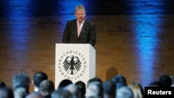 FILE - The President of the German Federal Intelligence Agency (BND) Bruno Kahl gives a speech at the 60th anniversary of the founding of the BND in Berlin, Nov. 28, 2016. 