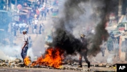 A barricade burns in Mozambique's capital, Maputo, Nov. 5, 2024, in protests that have engulfed the country after the opposition rejected the results of the country's polls which saw the Frelimo party extend its 58-year rule. 