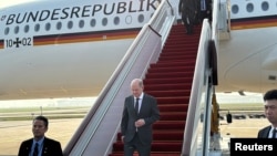 德国总理朔尔茨4月14日抵达中国重庆访问.