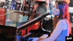 Singer Sara Bareilles performs on MTV's "Total Request Live" in 2008.