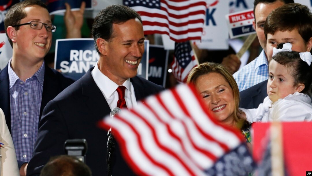 Former U.S. Sen. Rick Santorum, center, stands with his family as he announces his candidacy for the Republican nomination for president, May 27, 2015 in Cabot, Pennsylvania.