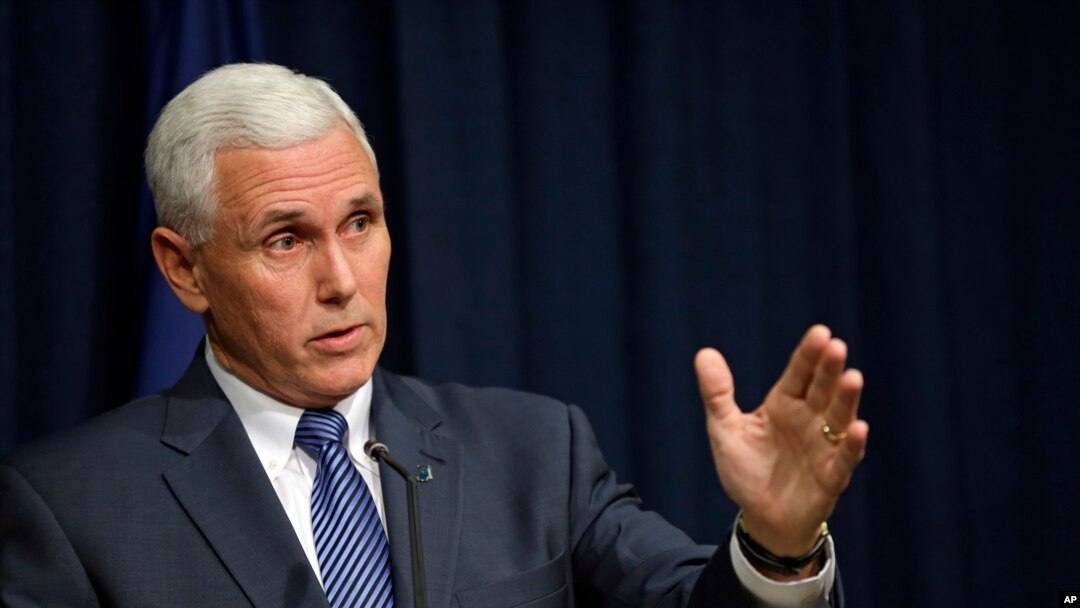 Gubernur Indiana Mike Pence telah menandatangani RUU keberatan berdasarkan agama yang ditolak beberapa pihak di tengah kekhawatiran aturan itu dapat mendiskriminasi kelompok LGBT. (AP/Michael Conroy)