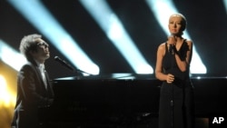 Ian Axel, left, of A Great Big World performs on stage with Christina Aguilera at the American Music Awards at the Nokia Theatre L.A. Live on Nov. 24, 2013, in Los Angeles.