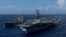 美国核动力航空母舰里根号（USS Ronald Reagan）在朝鲜半岛西南部水域进行海上补给 (2017年10月9日)