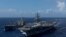 美国核动力航空母舰里根号（USS Ronald Reagan）在朝鲜半岛西南部水域进行海上补给 (资料照：2017年10月9日)