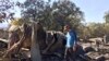 Marcos Morales, co-founder of pot company Legion of Bloom, stands on the ruins of a state-of-the-art drying shed in Glen Ellen, Calif., where 1,600 pounds of ready-to-ship bud were destroyed in a fire, Oct. 15, 2017.