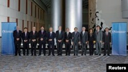 Trade ministers from a dozen Pacific nations in Trans-Pacific Partnership Ministers meeting post in TPP Ministers "Family Photo" in Atlanta, Georgia, October 1, 2015.