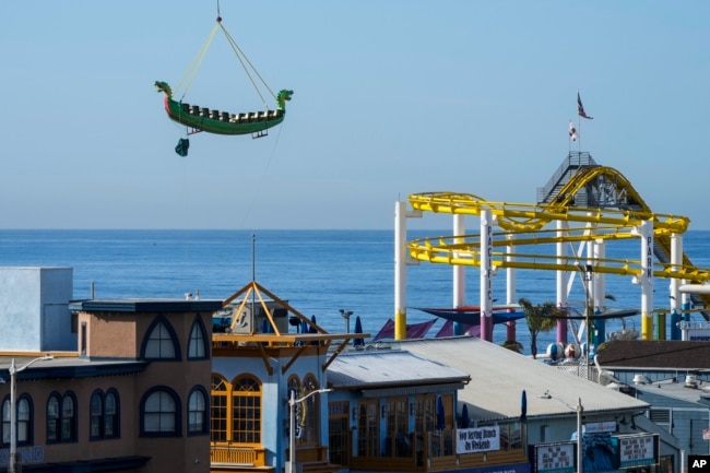 FILE - A view of the famous pier and amusement park in Santa Monica, California on March 9, 2023. (AP Photo/Jae C. Hong)