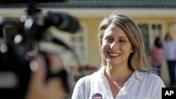 Katie Hill, then a Democratic Party candidate from California's 25th Congressional district, talks to a reporter after voting in her hometown of Agua Dulce, California, Nov. 6, 2018. 