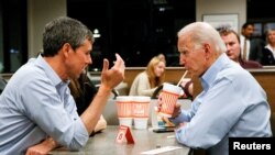 FILE - Former Democratic U.S. presidential candidate Beto O'Rourke and former U.S. Vice President Joe Biden visit a Whataburger after O'Rourke endorsed Biden's campaign for president in Dallas, Texas, March 2, 2020. 