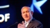 FILE - Israeli Prime Minister Benjamin Netanyahu speaks during an event marking one year since the US embassy moved to Jerusalem on May 14, 2019.