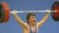 Turkey's Naim Suleymanoglu, seen in this 1988 file photo, died Saturday, Nov. 18, 2017. He was considered one of the sport's greatest athletes and earned his nickname for his strength and diminutive size. 
