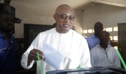 Jean-Pierre Fabre, opposition presidential candidate of the National Alliance for Change, casts his vote during the presidential election in Lome, Togo, Feb. 22 2020.