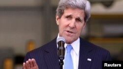 U.S. Secretary of State John Kerry speaks during a news conference at the anti-narcotics department of Colombia in Bogota, August 12, 2013. 