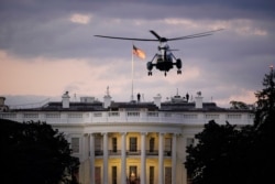 President Donald Trump arrives back at the White House aboard Marine One, Oct. 5, 2020, after being treated for COVID-19 at Walter Reed National Military Medical Center.