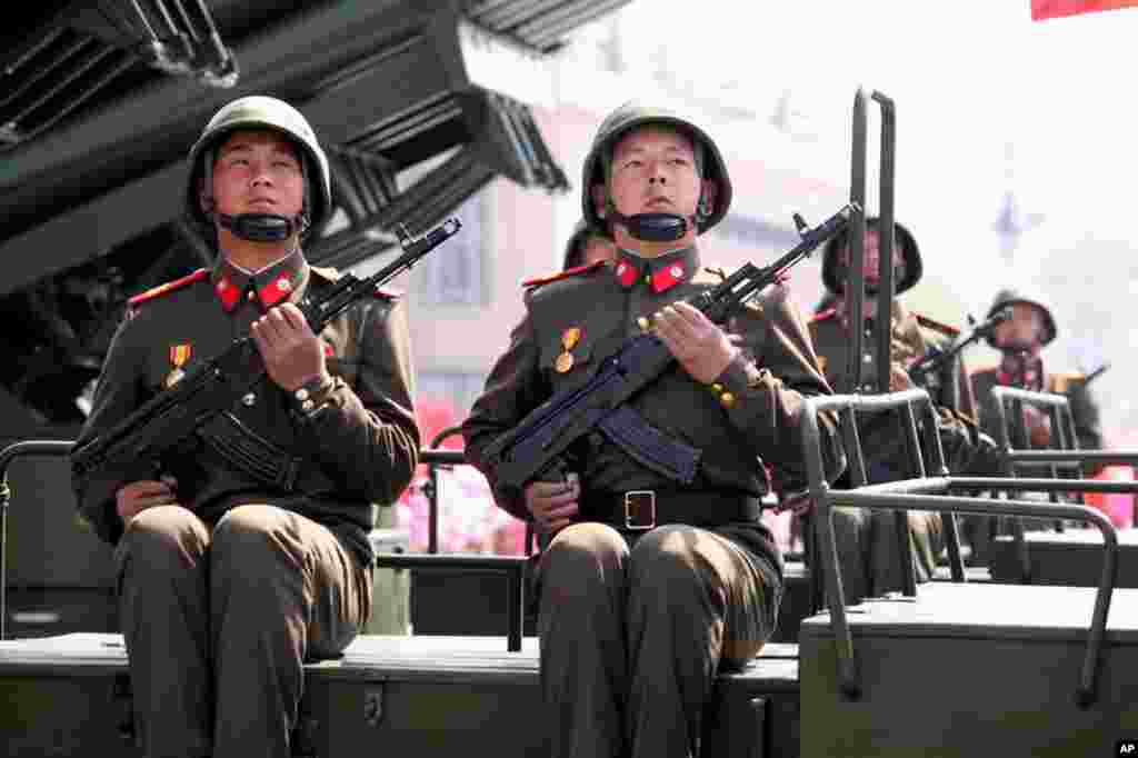North Korean soldiers ride on the back of a MLRS (multiple launch rocket system). (Sungwon Baik/VOA)