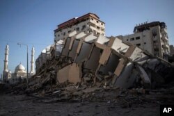 Escombros de un edificio destrozado por ataques aéreos de Israel en la Franja de Gaza el 12 de mayo de 2021.