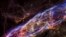 NASA's Hubble Space Telescope has unveiled a small section of the expanding remains of a massive star that exploded about 8,000 years ago.​ Called the Veil Nebula, the debris is one of the best-known supernova remnants, deriving its name from its delicate, draped filamentary structures. (Image Credit: NASA/ESA/Hubble Heritage Team)