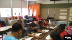 Teacher Gloria Pegram leads a summer school session at Bushman Elementary in Dallas, Texas