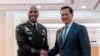 Cambodian Prime Minister Hun Manet, right, shakes hands with Gen. Ronald P. Clark, left, the commanding general of U.S. Army Pacific, left, during a welcome meeting at the Peace Palace in Phnom Penh, Cambodia, Feb. 24, 2025. 