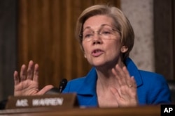 Senate Armed Services Committee member Elizabeth Warren questions Defense Secretary-designate James Mattis, Jan. 12, 2017 on Capitol Hill, during the committee's confirmation hearing for Mattis.