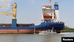 FILE PHOTO: Cargo ships heads from Black Sea to Danube, in Odesa region, Ukraine