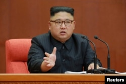 Kim Jong Un speaks during the Second Plenum of the 7th Central Committee of the Workers' Party of Korea (WPK) at the Kumsusan Palace of the Sun, in this undated photo released by North Korea's Korean Central News Agency (KCNA) in Pyongyang, Oct. 8, 2017.