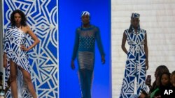 Models wear creations by Niger's designer Alia Bare during Johannesburg Fashion Week 2023 in Johannesburg, South Africa, Thursday, Nov. 9, 2023.