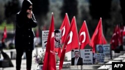 A woman mourns at the Soma cemetery where miners killed in the worst industrial accident in Turkey's history are buried in Manisa, April 12, 2015. 