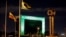 The headquarters of the South American Football Confederation (CONMEBOL) in Luque, Paraguay, is lit up in green to pay tribute to members of Chapecoense soccer team involved in the plane crash in Colombia, Nov. 30, 2016.
