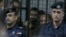 Guards surround the defendants' cage in state security court as judges sentenced 10 defendants to prison, with terms ranging from three years to life, for their role in an Islamic State attack on the Karak castle, a popular tourist site, Nov. 13, 2018, in