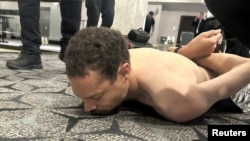 مظنون که کول توماس الن نام دارد، توسط نیرو های امنیتی بازداشت شد