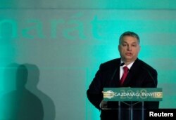 Hungarian Prime Minister Viktor Orban talks during a forum of the chamber of industry in Budapest, Hungary, March 6, 2018.