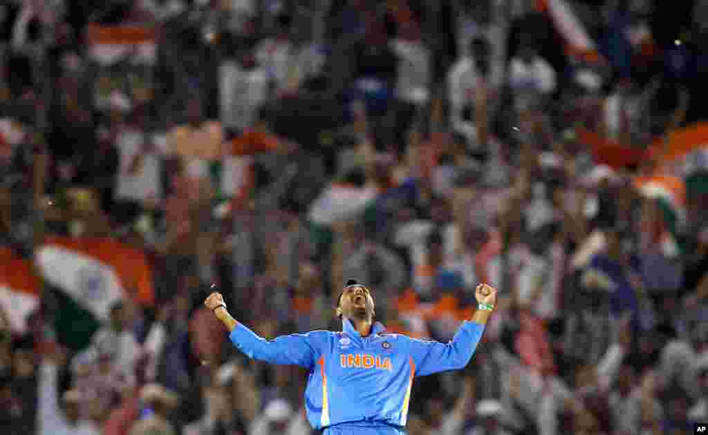 India's Harbhajan Singh celebrates the wicket of Pakistan's captain Shahid Afridi during their ICC Cricket World Cup 2011 semi-final match in Mohali, March 30, 2011. (Reuters)