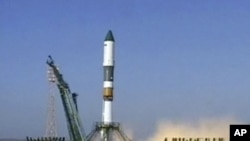 In this image made from Rossiya 24 television channel a Soyuz rocket booster carrying Progress supply ship is launched from the Baikonur cosmodrome in Kazakhstan. (File Photo - August 24, 2011)