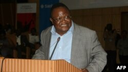 FILE - Tanzanian opposition politician Tundu Lissu speaks during the Tanganyika Law Society (TLS) annual meeting in Arusha, during which he was elected as president, March 17, 2017.