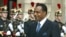 FILE - President of the Republic of Congo Denis Sassou N'Guesso arrives at the Elysee Palace in Paris, Sept. 20, 2002. N'guesso seeks to extend his already three decades in power in elections Sunday.