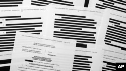 Các trang từ một bản tuyên thệ của FBI làm cơ sở cho lệnh khám xét tư gia ở Mar-a-Lago của cựu Tổng thống Donald Trump được chụp vào thứ Sáu, ngày 26 tháng 8 năm 2022. 