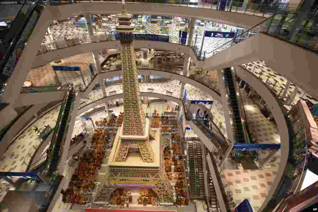 Buddhist monks pray during a ceremony to reopen the Terminal 21 shopping mall in Nakhon Ratchasima, Thailand.