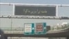 بیلبورد یک بزرگراه در ایران که هک‌شده و روی آن عبارت «خامنه‌ای بنزین ما کو» نوشته شده است (آرشیو)
