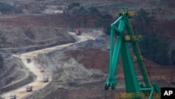 Dump trucks maneuver Indonesia Weda Bay Industrial Park at Central Halmahera, North Maluku, June 8, 2024. (AP Photo/Achmad Ibrahim)