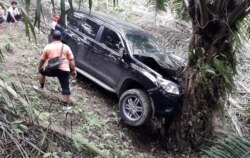 Mobil milik Jamaluddin yang ditemukan di areal perkebunan kelapa sawit milik warga di Kutalimbaru, Sumatera Utara, Jumat, 29 November 2019. (Foto courtesy: Polsek Kutalimbaru)