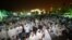 FILE - Kuwaiti citizens gather at al-Irada Square, Kuwait City, to protest against government corruption and demand transparency in government, June 10, 2014.