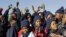 Children sing 'Happy Birthday' in honor of former South African President Nelson Mandela during celebrations for Mandela's birthday in Mvezo, South Africa, July 18, 2012.