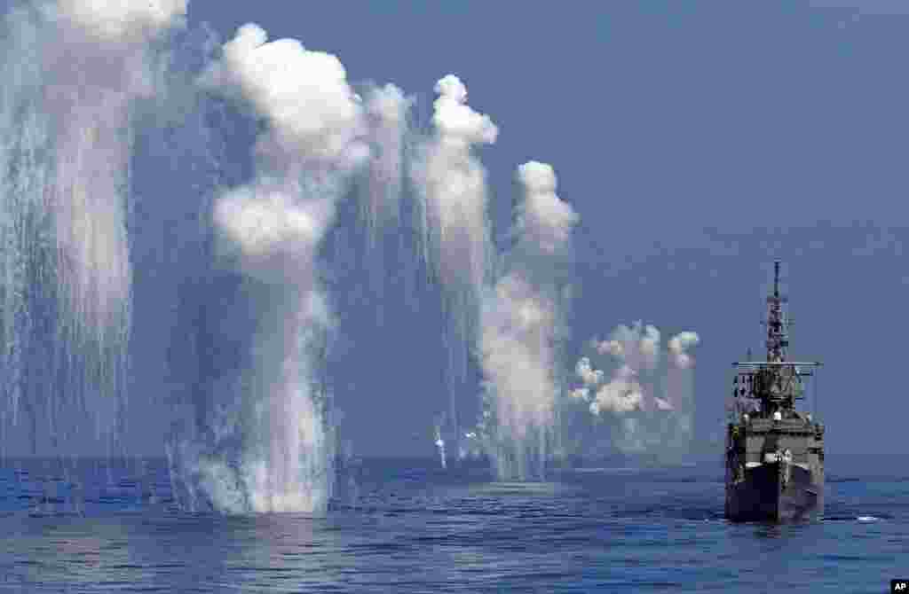 Taiwan Navy's Perry-class frigate fires chaff during the annual Han Kuang military exercises off the east coast of Hualien, central Taiwan.