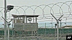 Barbed wire fence at the Camp Delta detention compound which houses foreign prisoners since 2002 at Guantanamo Bay U.S. Naval Base in Cuba