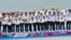 018 자카르타·팔렘방 아시안게임 여자 카누 용선 200m 대회에 참가한 남북 단일팀이 금메달을 목에 걸고 있다.