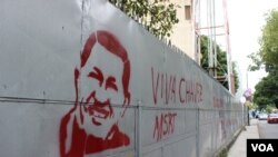 La Sala Constitucional designó por quinta vez en 20 años a la directiva del poder electoral en Venezuela, a pesar de ser competencia del Parlamento. Foto de archivo de un grafitti en homenaje al presidente Hugo Cávez, en una calle de Caracas.
