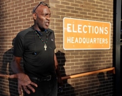 Former felon Robert Eckford talks with reporters after registering to vote at the Supervisor of Elections office Jan. 8, 2019, in Orlando, Fla.