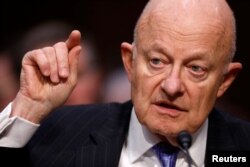 FILE - Former Director of National Intelligence James Clapper testifies about potential Russian interference in the presidential election before the Senate Judiciary Committee on Capitol Hill, Washington, D.C., May 8, 2017.
